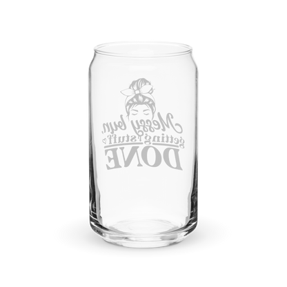 a clear glass with a white lettering on it