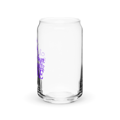 a clear glass with purple writing on it