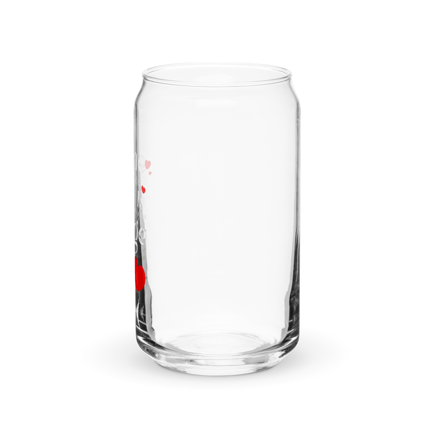 a clear glass with a red handle on a black background