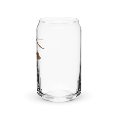 a clear glass jar with a black background