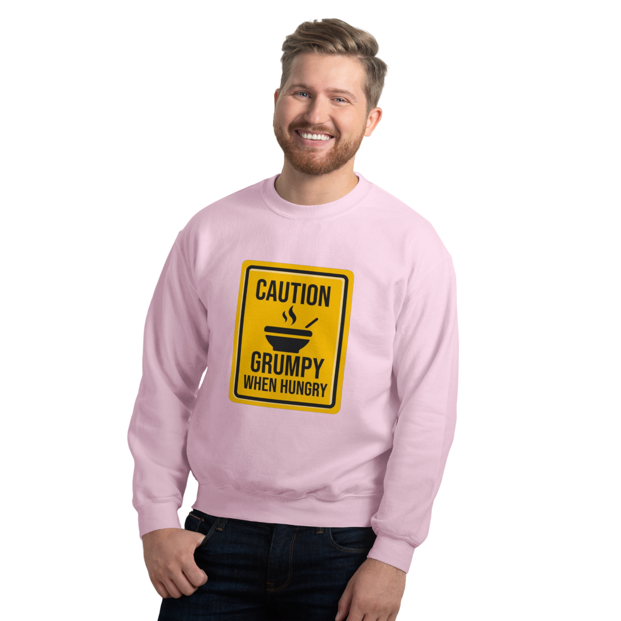 a man wearing a pink sweatshirt with a caution sign on it