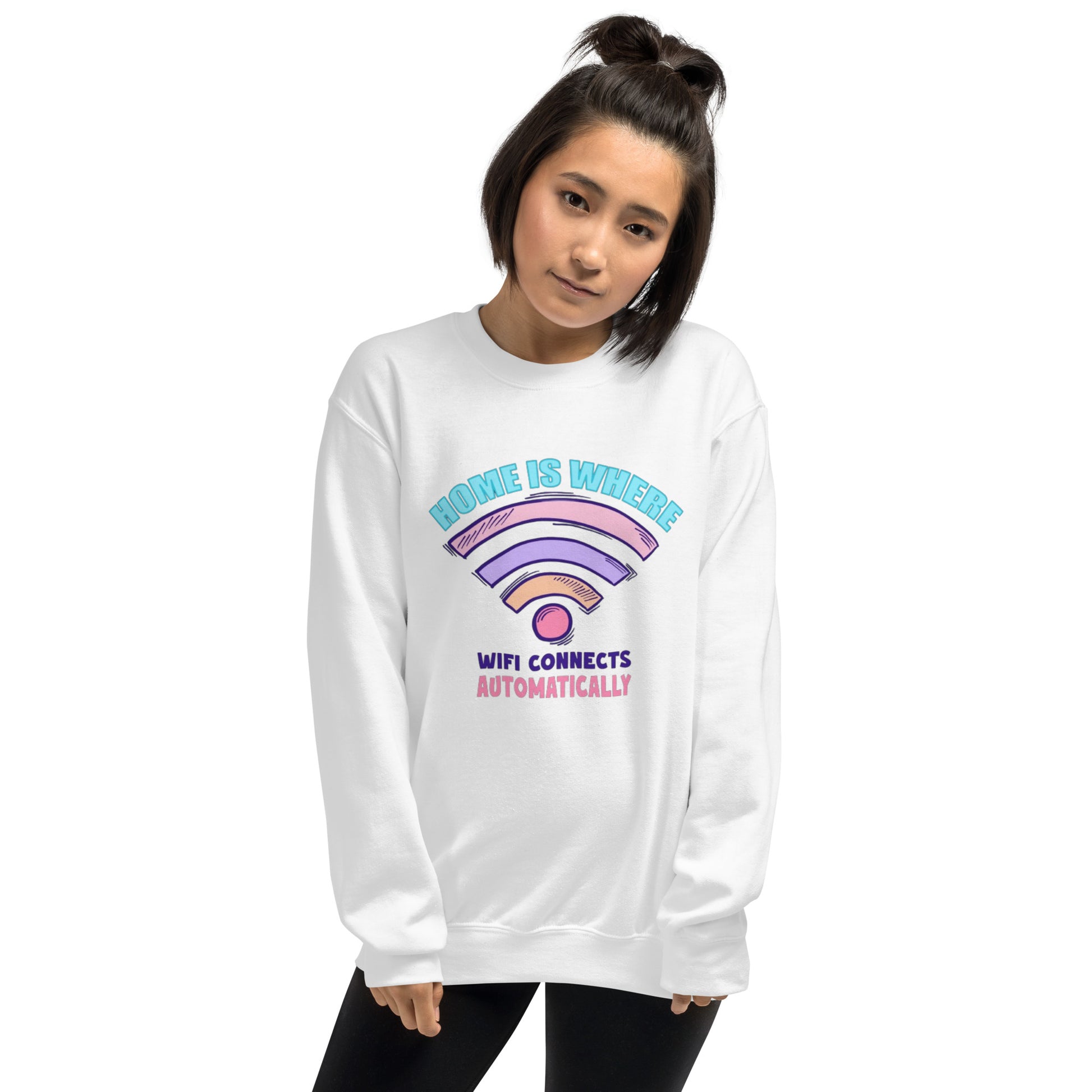 a woman wearing a white sweatshirt with a rainbow design